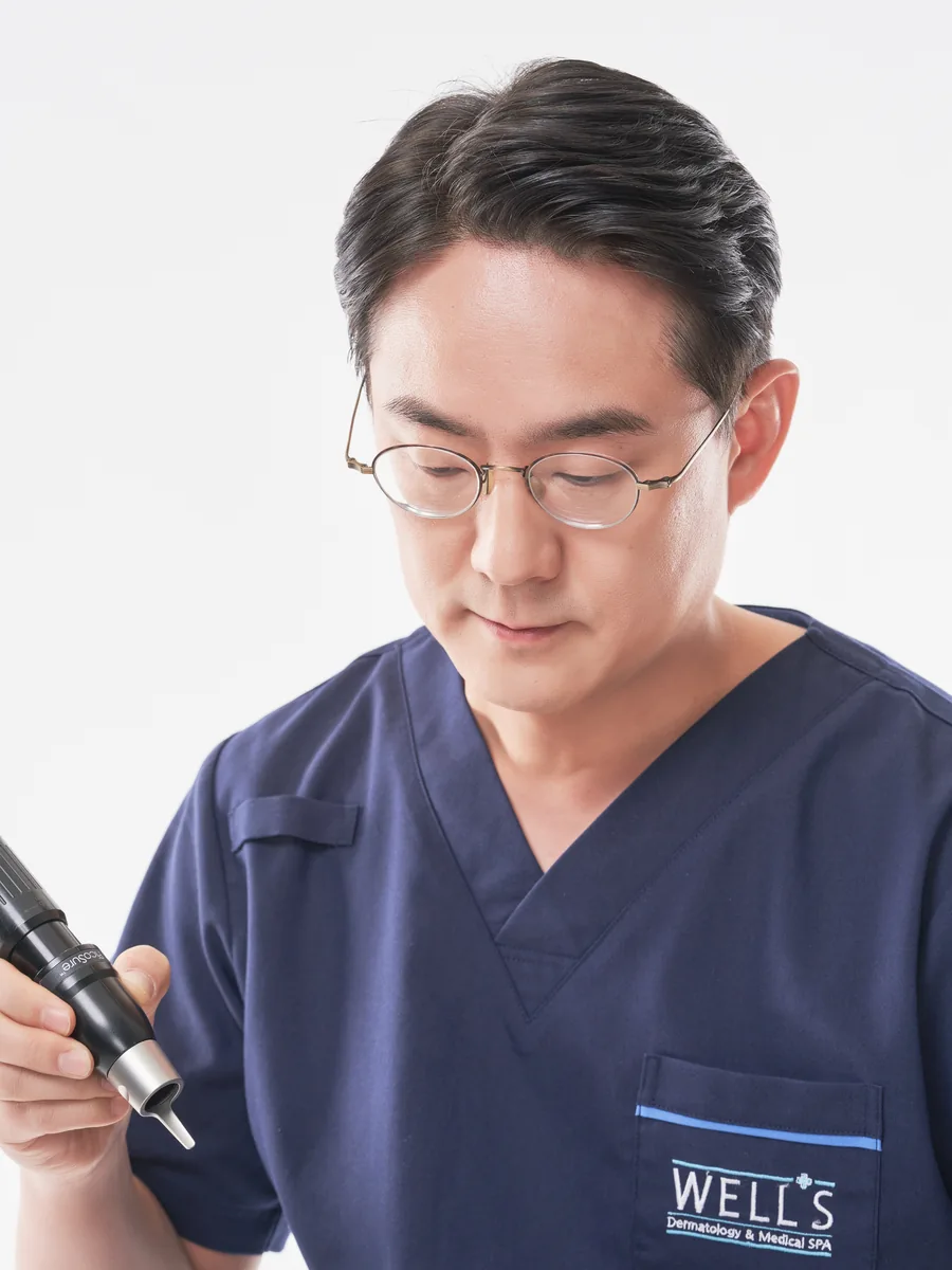 Dr. Won Woo Choi preparing a skin treatment device