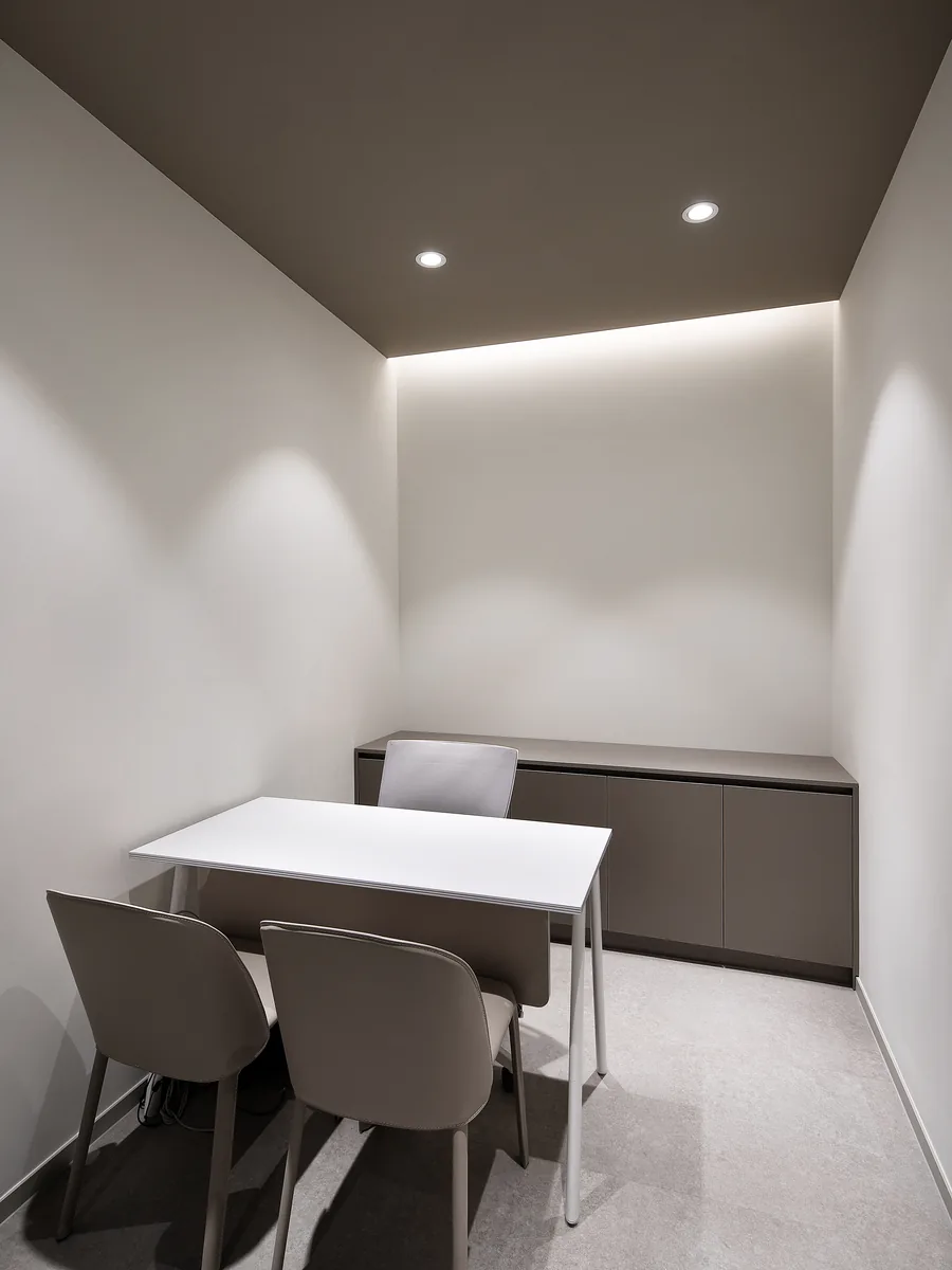 Consultation room where board-certified dermatologists consult patients at Wells Clinic